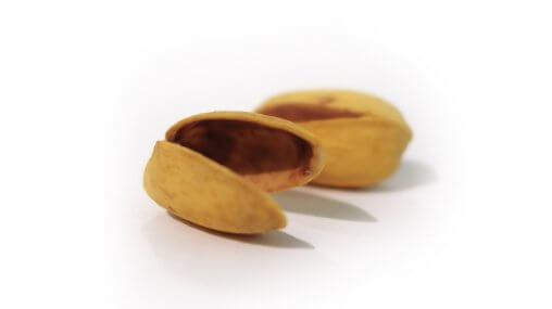 Ask An Iranian - What went right in 2020, in Iranian - Empty pistachio nuts on white background